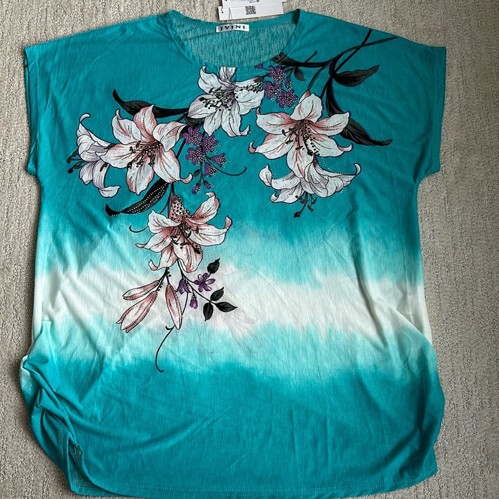 Floral blouse with rhinestones.  Rushed sides- one size fits most. NWT smokefree